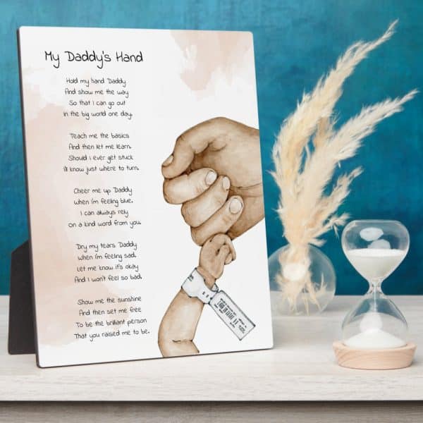 A Framed Poem Titled My Daddy'S Hand, Featuring An Illustration Of A Father'S Hand Holding His Child'S.