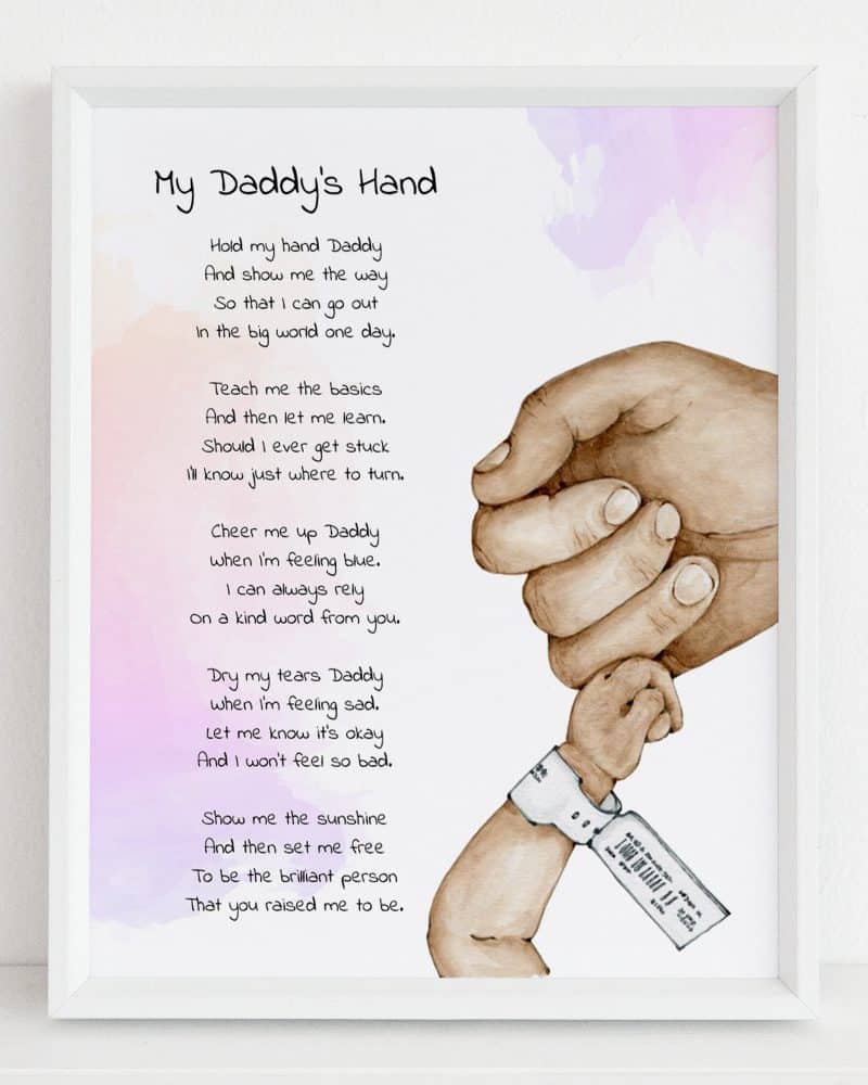 A framed illustration of an adult hand gently holding a baby's hand, accompanied by a poem titled My Daddy's Hand.