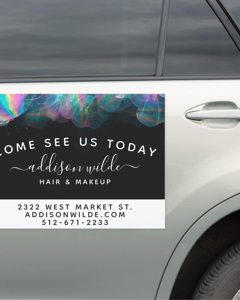 Car magnet advertising Addison Wilde Hair & Makeup, featuring colorful abstract design.