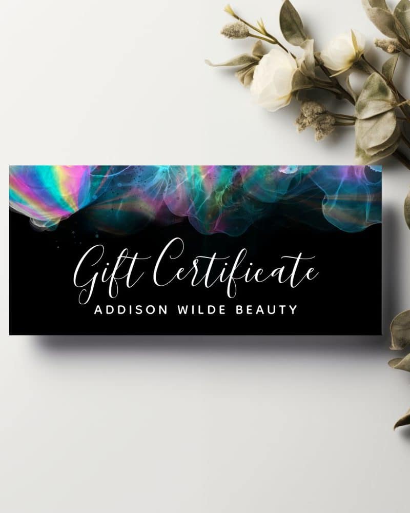 Addison Wilde Beauty gift certificate with iridescent design on black background.