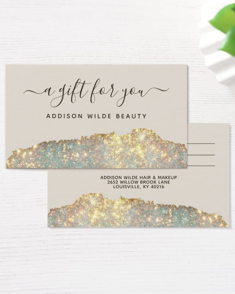 Addison Wilde Beauty gift card with gold glitter design.
