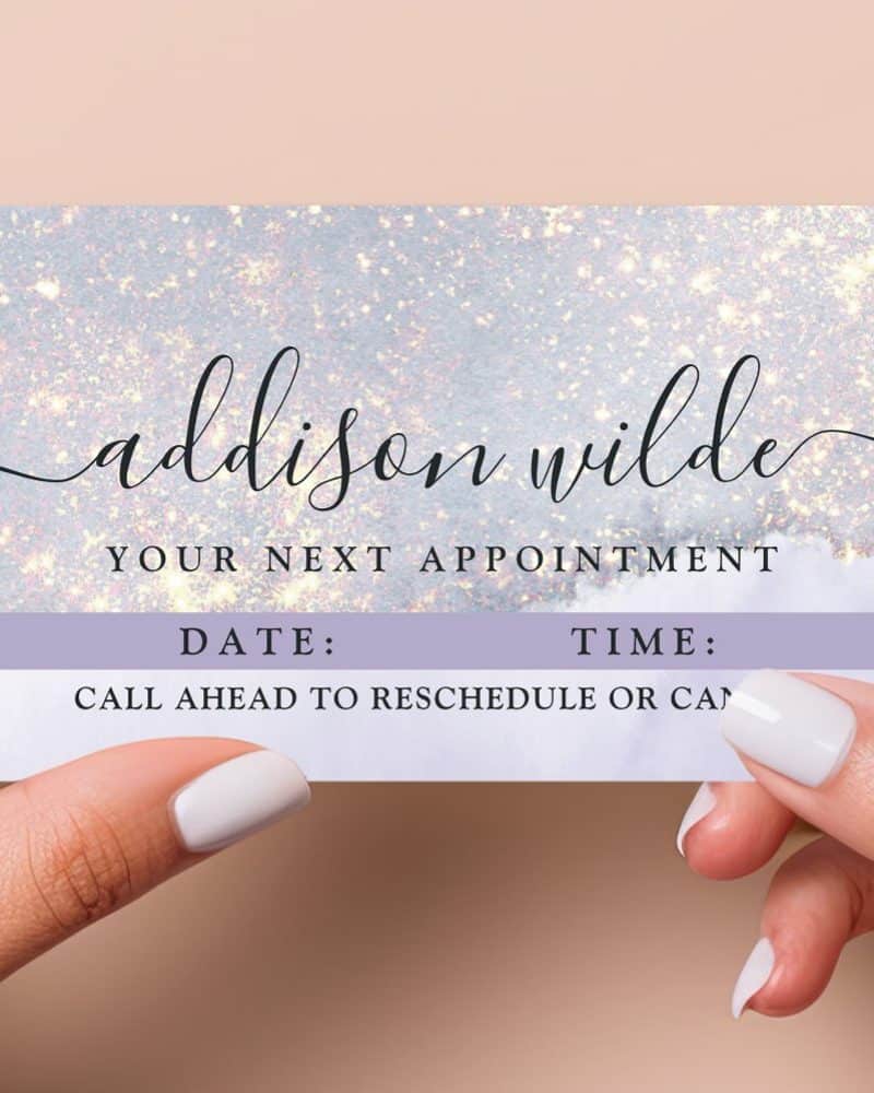 Appointment reminder card for Addison Wilde with space to fill in date and time. The card has a sparkly, light gray background.