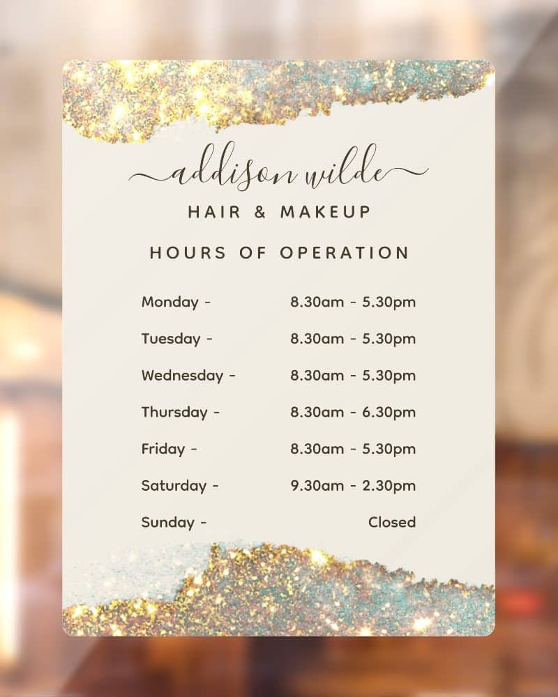 Addison Wilde Hair & Makeup business hours sign with a sparkly design.