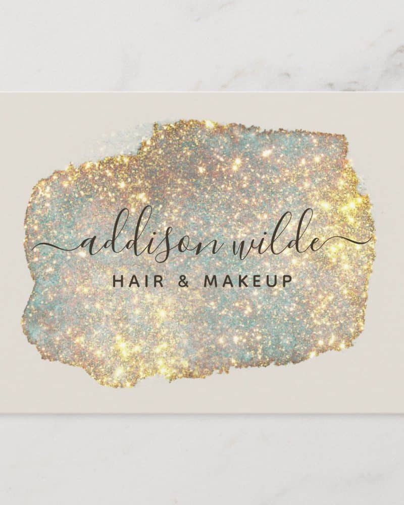 Business card for Addison Wilde Hair & Makeup; design features a sparkly, gold and teal abstract watercolor wash.