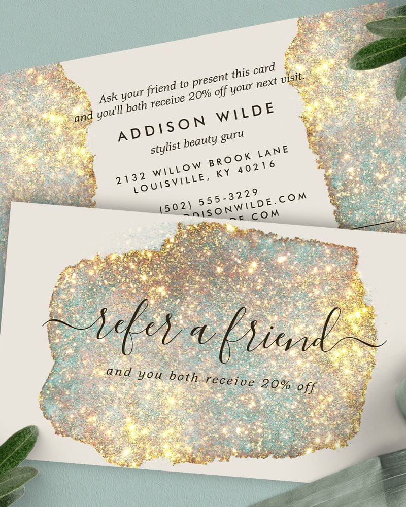 Two refer-a-friend cards with gold glitter accents. The cards advertise 20% off for both the referrer and friend.