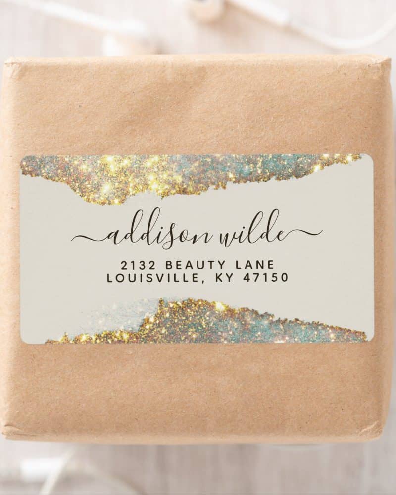 Return address label with gold and teal glitter design, showing Addison Wilde's address.