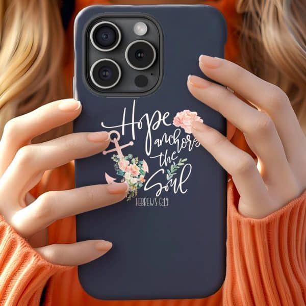 A Dark Blue Phone Case Featuring A Floral Anchor Design And The Text Hope Anchors The Soul, Hebrews 6:19.