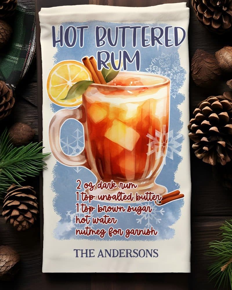 Tea towel with illustrated recipe for hot buttered rum.