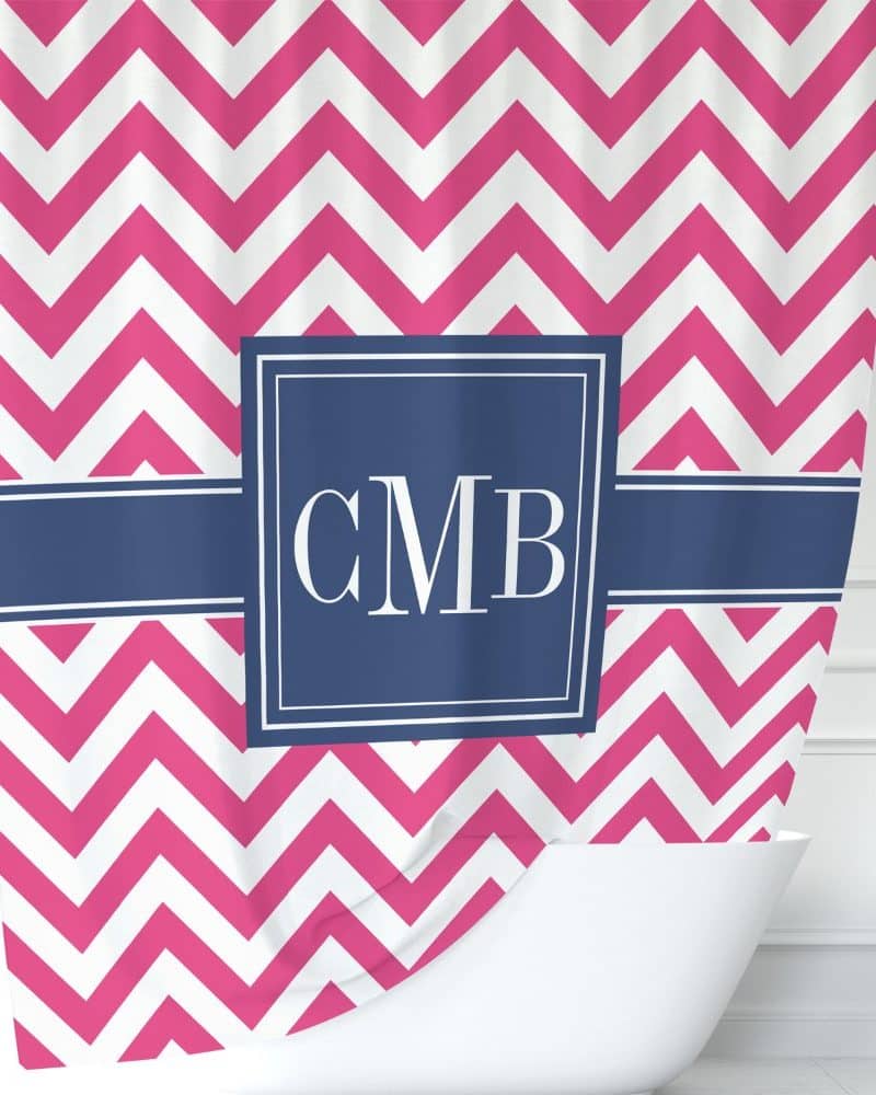 Pink and white chevron patterned shower curtain with navy blue monogram CMB.