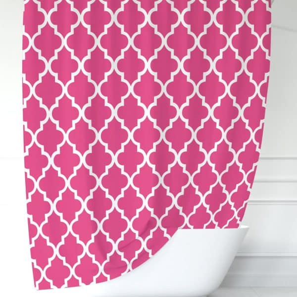 Pink Shower Curtain With A White Quatrefoil Pattern.