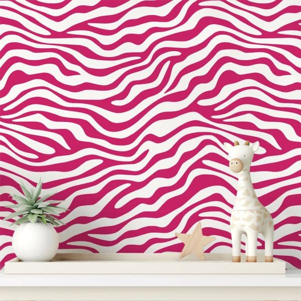 Pink And White Zebra Striped Wall With A Small Giraffe Figurine And A Succulent Plant.