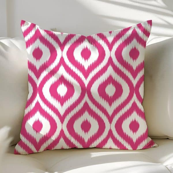 Pink And White Ikat Patterned Throw Pillow.