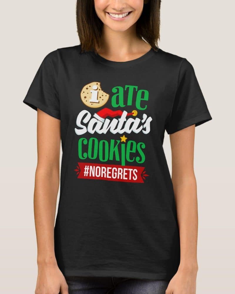 Woman wearing a black t-shirt that says I ate Santa's cookies #noregrets.
