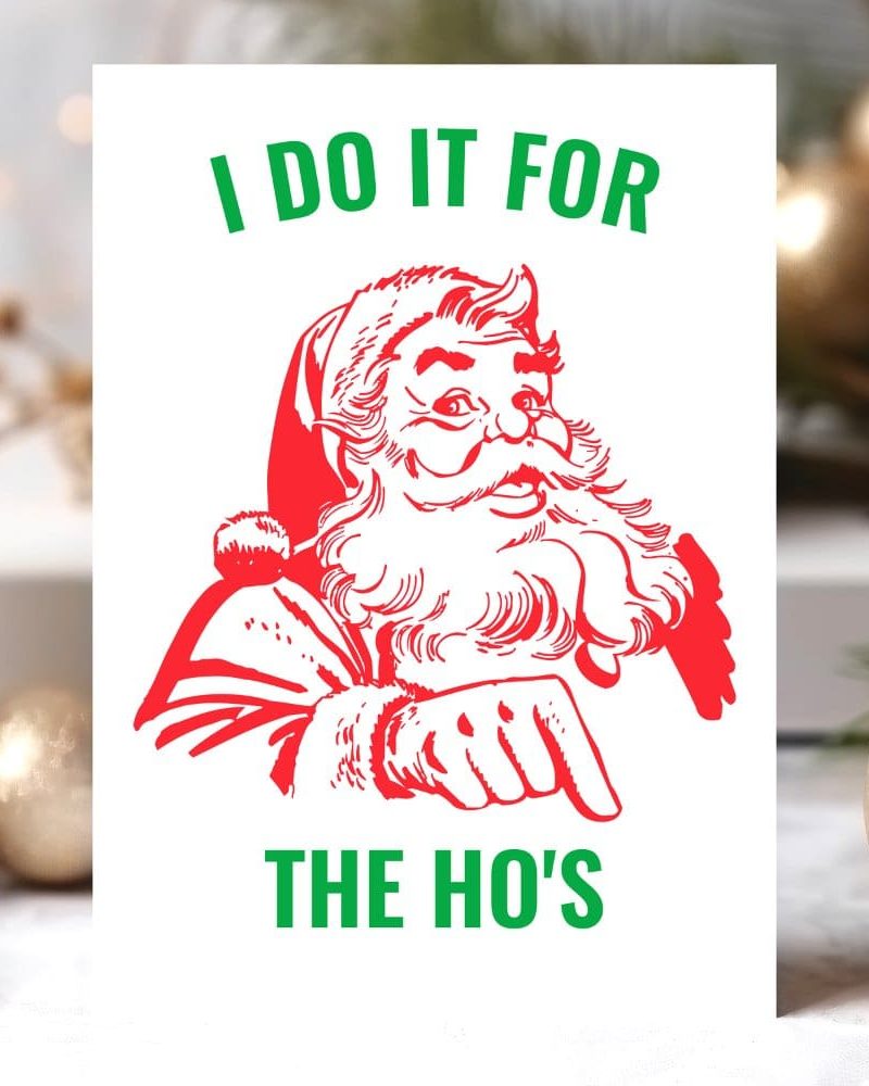A red illustration of Santa Claus pointing, with green text above and below reading I DO IT FOR and THE HO'S.