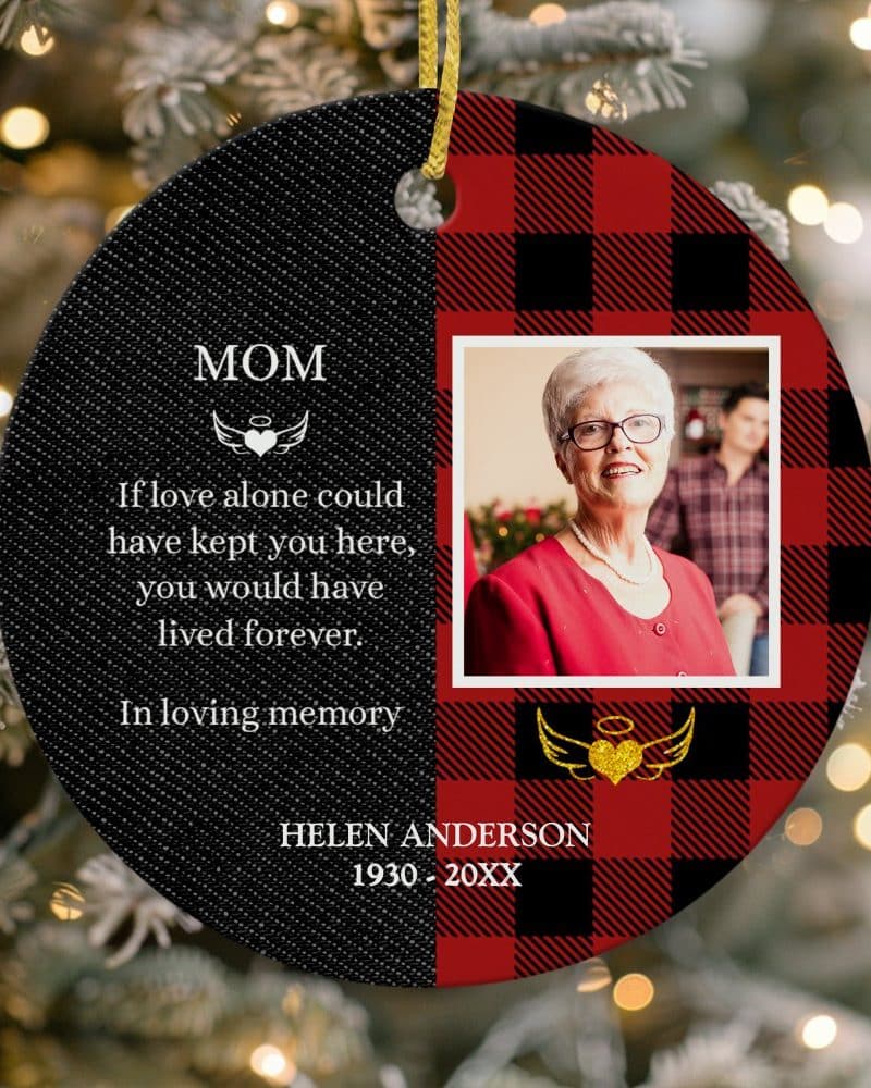 Round Christmas ornament with a photo of Helen Anderson, 1930-20XX, and a message expressing remembrance.