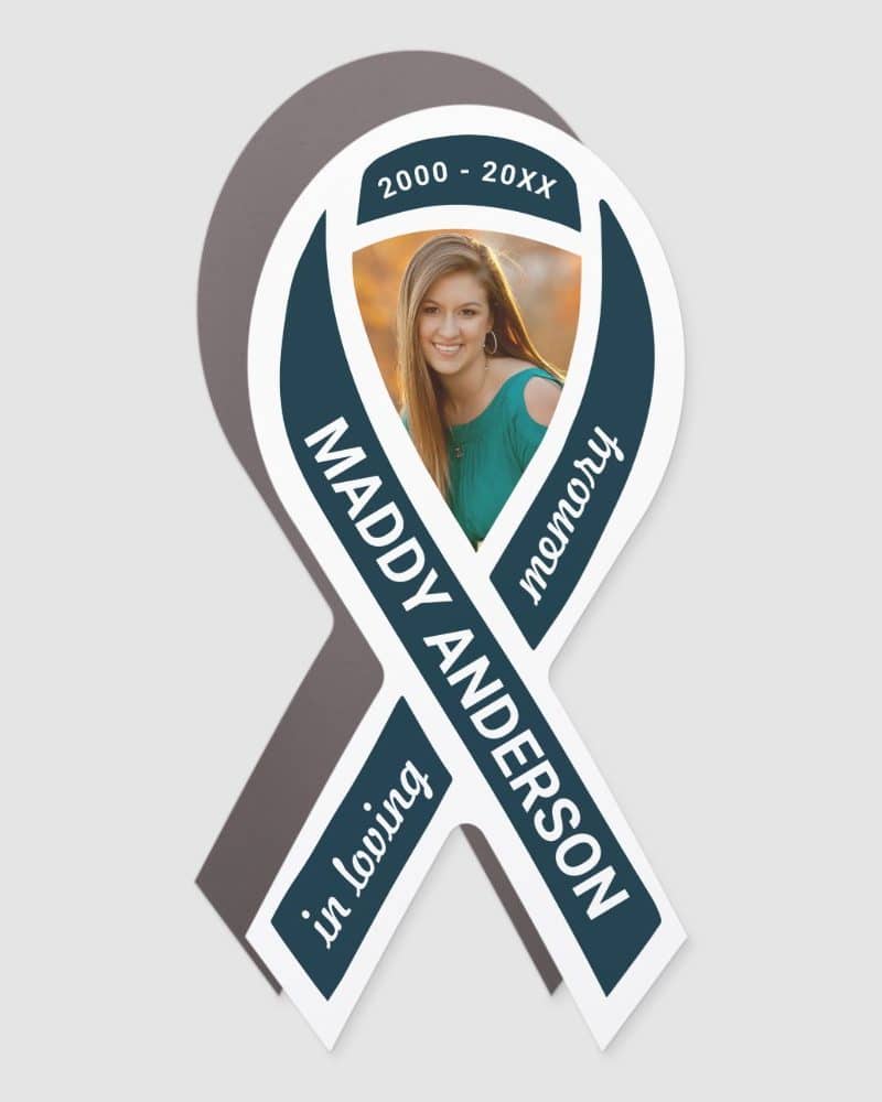Memorial ribbon sticker with a photo of Maddy Anderson, 2000-20XX.