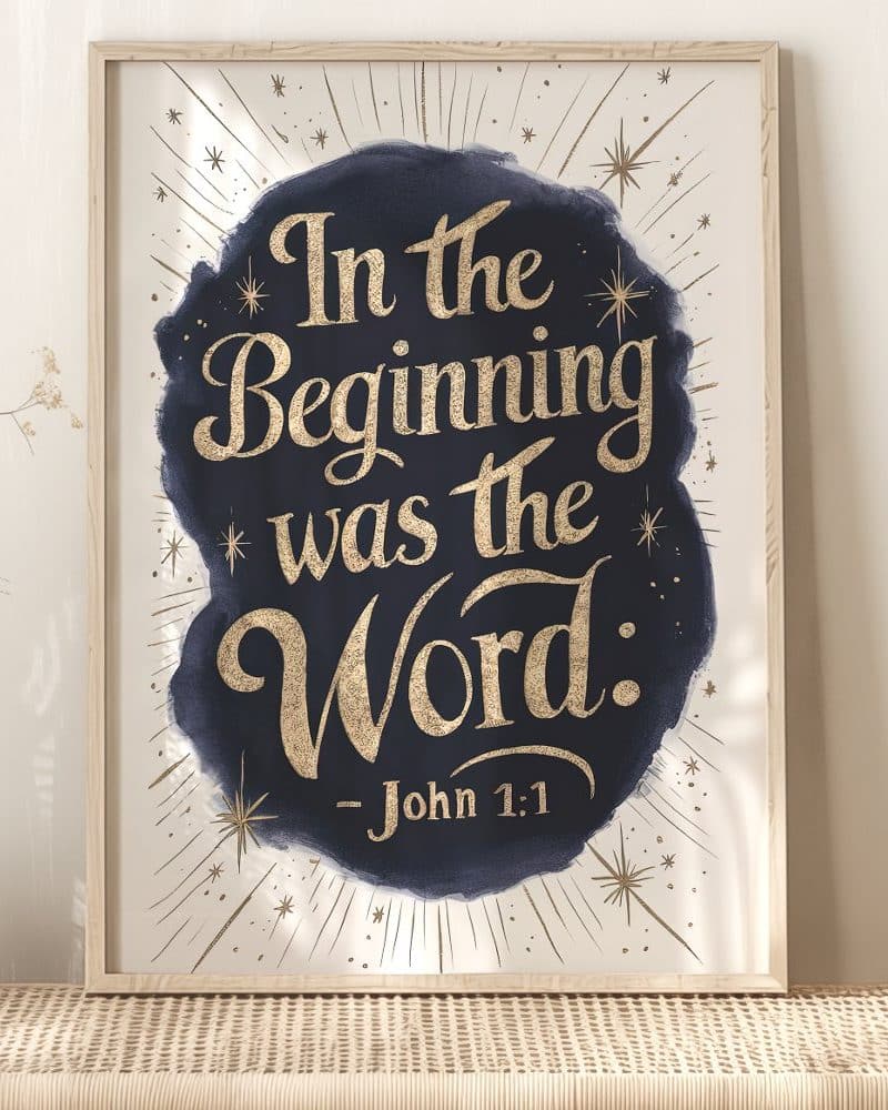 Framed print with gold lettering on a dark blue background. The text reads In the Beginning was the Word: John 1:1.