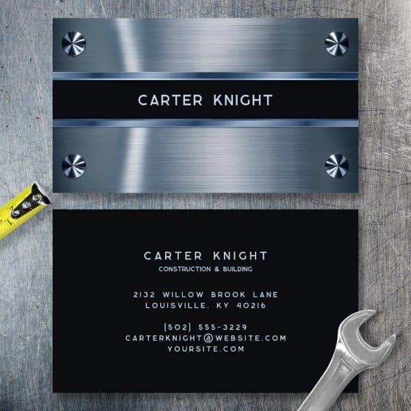 Two Business Cards For Carter Knight Construction &Amp; Building. The Top Card Features A Brushed Metal Design, The Bottom Card Is Black With Contact Information.