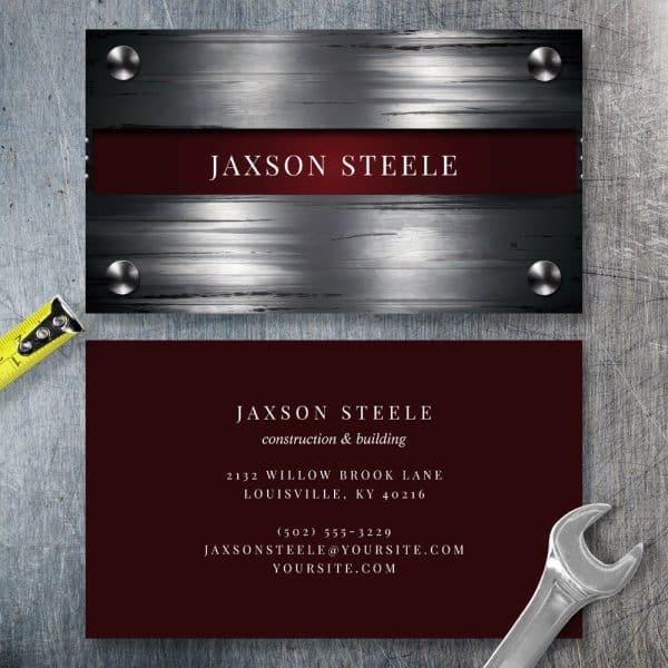 Business Card For Jaxson Steele Construction And Building. The Card Features A Metallic Design.