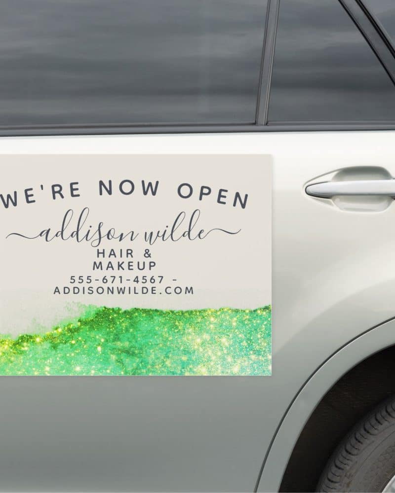 Car magnet announcing the grand opening of Addison Wilde Hair & Makeup, including contact information.