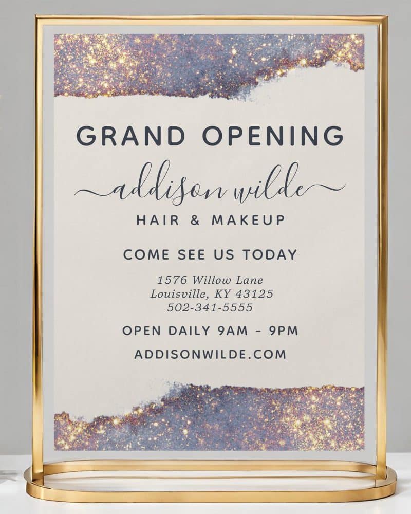 Grand opening sign for Addison Wilde Hair & Makeup, including address and hours.