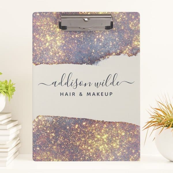 A Clipboard With A Sparkly, Gold And Purple Design And The Name Addison Wilde Hair &Amp; Makeup.