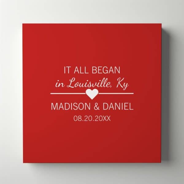 Red Square Canvas With White Text: It All Began In Louisville, Ky, A Small Heart, Madison &Amp; Daniel, And A Date.