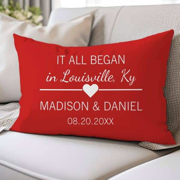 Red Pillow With White Text: It All Began In Louisville, Ky, Madison &Amp; Daniel, And A Date.
