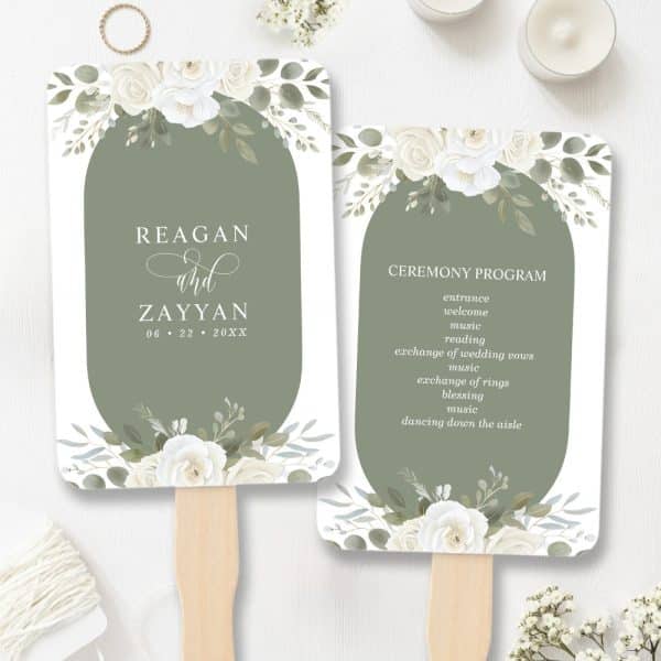 Two Wedding Ceremony Hand Fans, One With The Couple'S Names And Wedding Date, The Other With The Ceremony Program. Both Feature White Flowers And Greenery On An Olive Green Background.