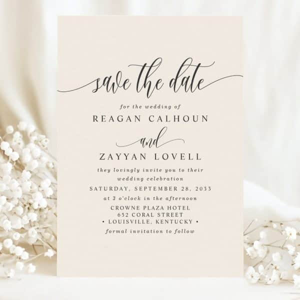 Beige Save-The-Date Card Announcing The Wedding Of Reagan Calhoun And Zayyan Lovell On September 28, 2033, At The Crowne Plaza Hotel In Louisville, Kentucky.