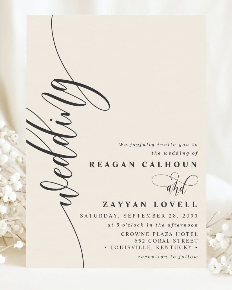 Wedding invitation for Reagan Calhoun and Zayyan Lovell, September 28, 2033, at the Crowne Plaza Hotel in Louisville, Kentucky.