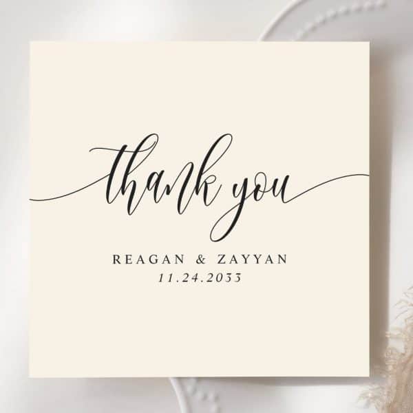 Cream-Colored Thank You Card With Elegant Script Lettering. The Names Reagan &Amp; Zayyan And The Date 11.24.2033 Are Also Included.