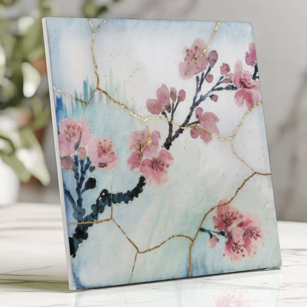 Square Artwork Depicting Pink Cherry Blossoms On A Light Blue Background With Gold Crackle Detailing.
