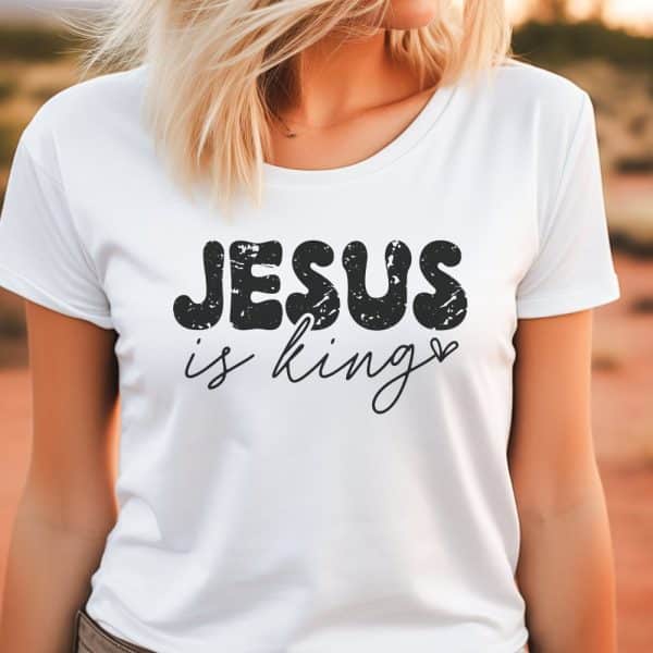 Woman Wearing A White T-Shirt With The Text Jesus Is King.