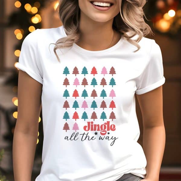 White T-Shirt With A Design Of Colorful Christmas Trees And The Text Jingle All The Way.