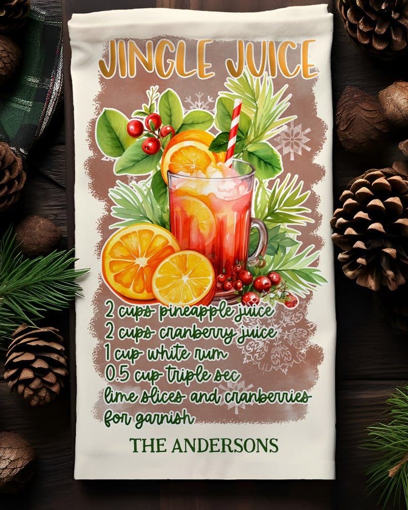 Kitchen towel with a watercolor illustration of a festive Jingle Juice cocktail recipe, including ingredients and the Andersons family name.