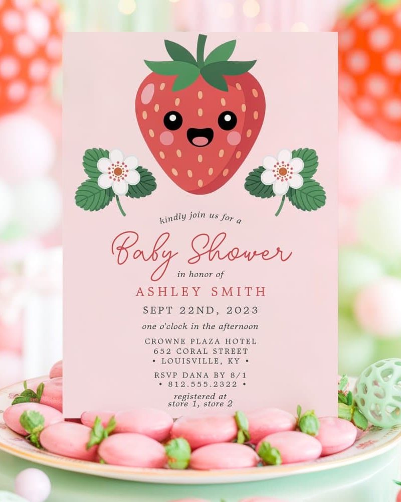 Baby shower invitation featuring a cute cartoon strawberry.