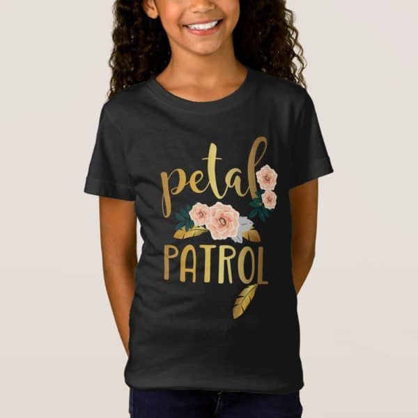 Girl Wearing A Black T-Shirt With Gold Lettering That Says Petal Patrol And Peach Flowers.