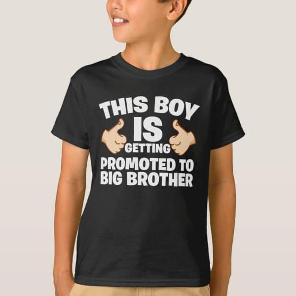 Boy Wearing A Black T-Shirt That Says This Boy Is Getting Promoted To Big Brother.