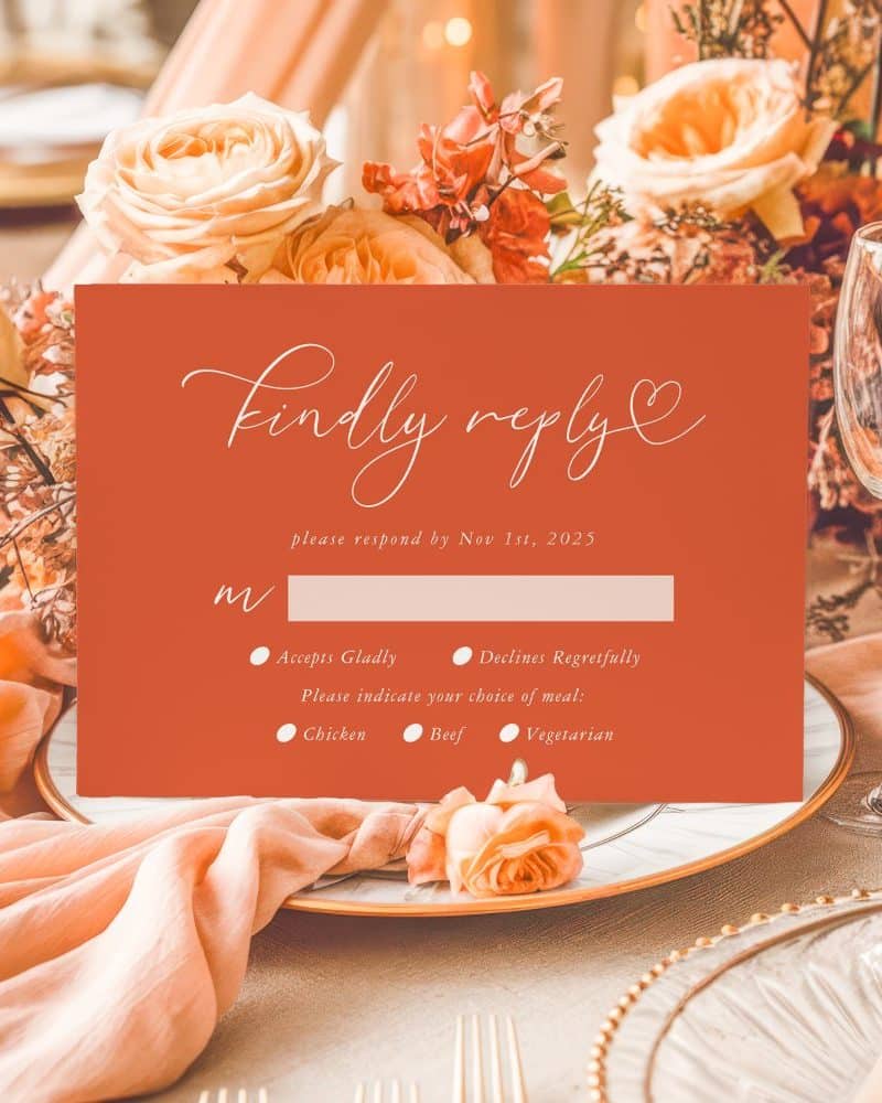 Burnt orange wedding RSVP card with a request for meal choice.