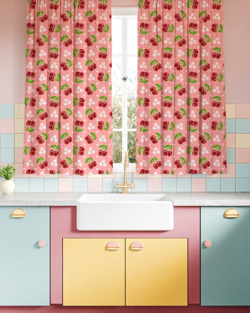 Cherry-printed kitchen window curtains.