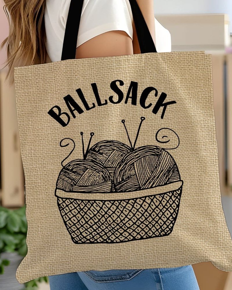 Beige tote bag with black text reading Ballsack and a drawing of a basket of yarn.