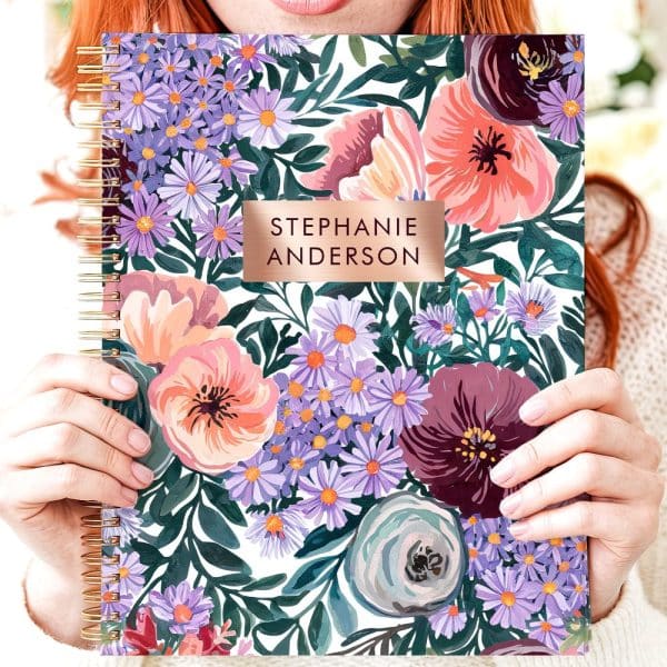 A Spiral-Bound Notebook With A Floral Design And The Name Stephanie Anderson.