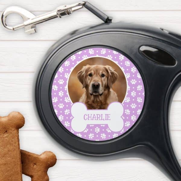 Retractable Dog Leash With A Personalized Design Featuring A Golden Retriever'S Photo, The Dog'S Name Charlie, And Paw Prints.