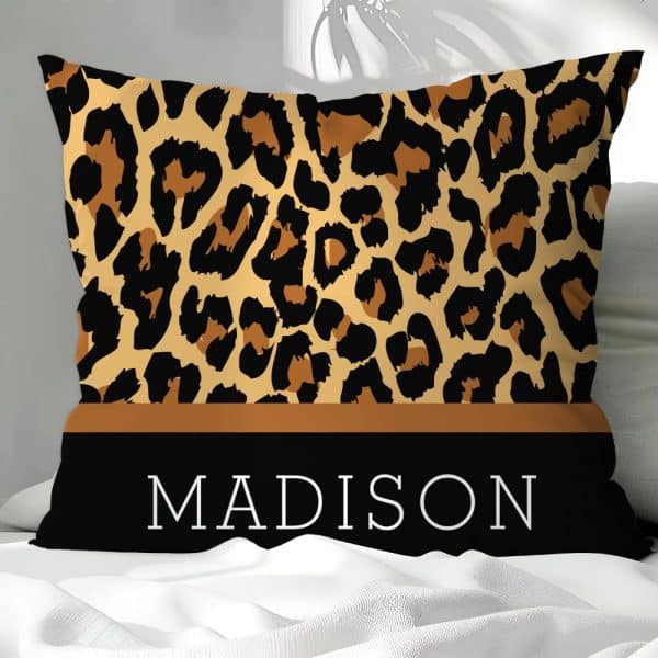 Leopard Print Pillow With The Name Madison.