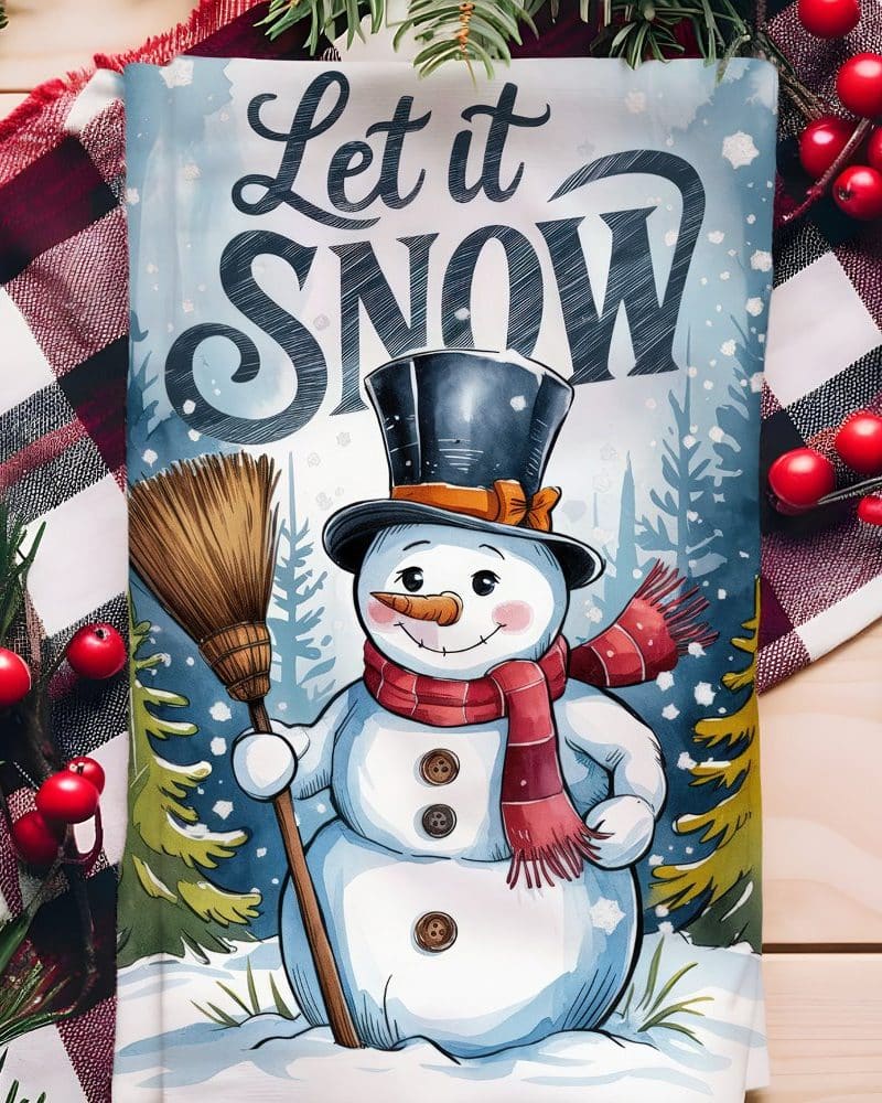 A cheerful snowman holding a broom stands in a snowy winter scene. The words Let it Snow are above him.