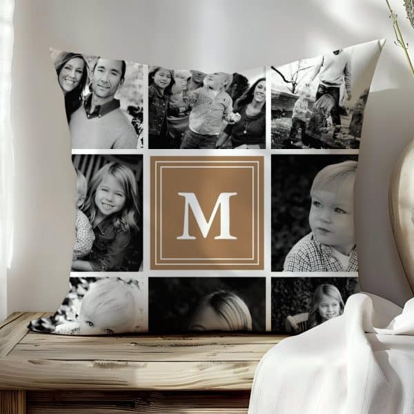 A Square Pillow With A Collage Of Black And White Family Photos And A Large Brown Initial M In The Center.
