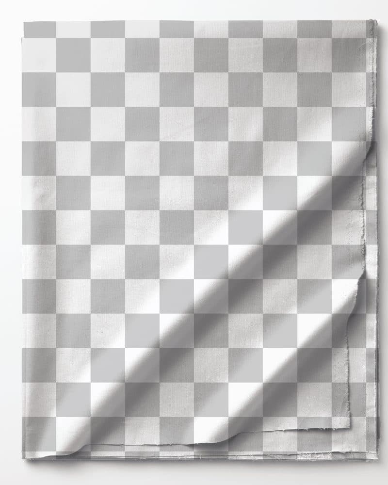 Folded fabric with a gray and white checkered pattern.