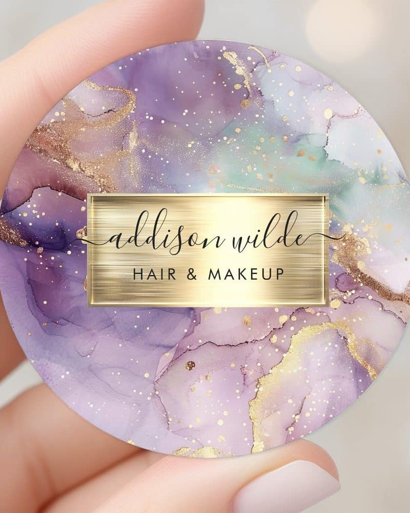 Round hair and makeup business logo with purple, mint, and gold marble design and Addison Wilde text.