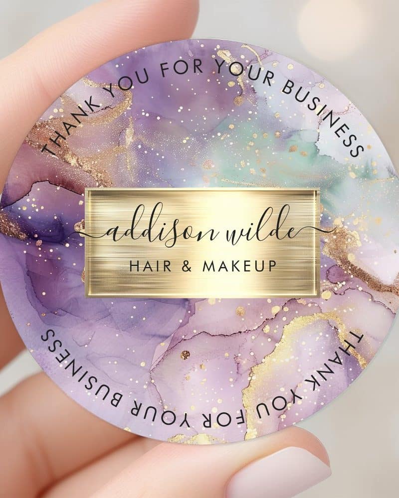 Round thank you sticker with purple and gold watercolor design; Addison Wilde Hair & Makeup.